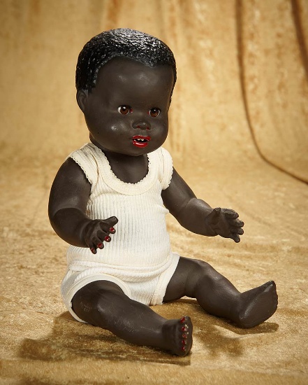 17" English black-complexioned character doll with original signed undergarments. $300/400