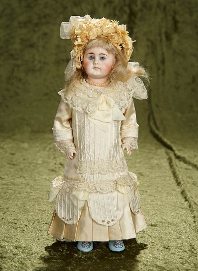 13" German bisque closed mouth doll, model 300, by mystery maker. $400/500