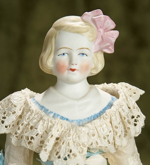 11" German bisque character girl by Hertwig/ $200/300