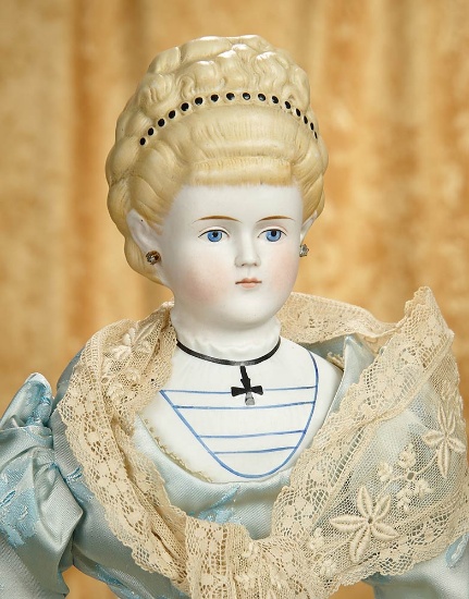 25" German bisque lady doll with elaborate blonde sculpted hair and fancy bodice. $500/700