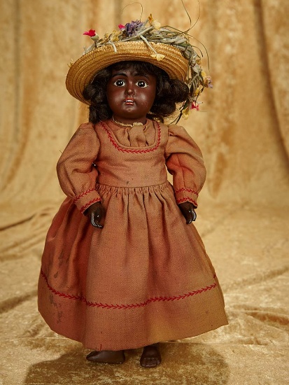 15" German brown complexioned bisque child by Kestner, nice antique costume. $600/900