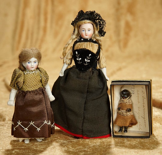 7" German bisque dollhouse doll in original costume, and two other dolls. $300/500