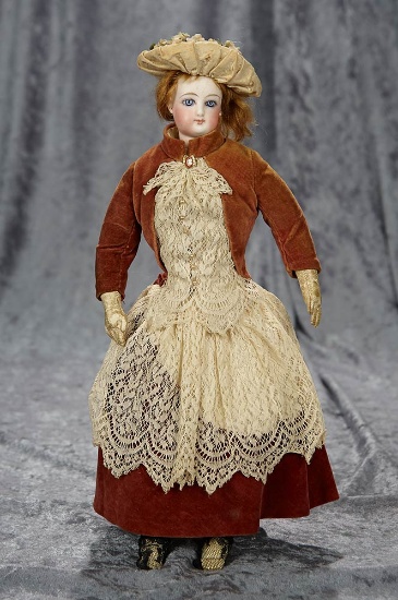 13" French bisque poupee attributed to Jumeau with pretty antique costume. $1000/1300