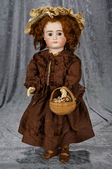 21" German bisque child by Kestner with closed mouth, original early body. $1200/1400
