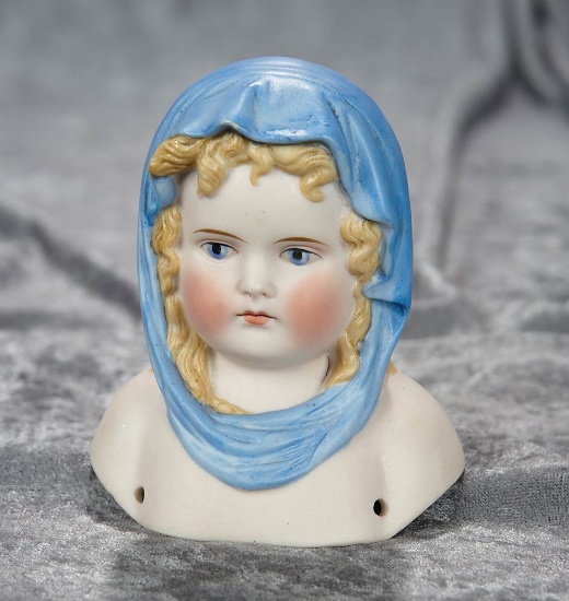 4 1/2" German bisque doll head known as "Blue Scarf Lady". $400/500