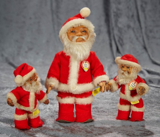 5"-8" Three Santa Clauses by Steiff with original costumes, silver buttons and cloth tags. $200/400