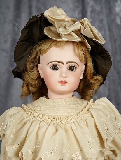 24" French bisque brown-eyed Bebe Jumeau, 11, Jumeau, original body, closed mouth. $2400/2800