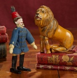 American Bisque Head Lion Tamer and Glass-Eyed Lion by Schoenhut 900/1100