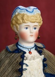 German Bisque Lady Doll with Sculpted Blue Cap and Ruffled Collar 1100/1400