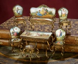 Seven Viennese Bronze and Enamel Miniature Furnishings 600/800