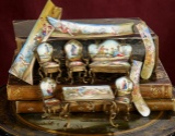 Eleven Viennese Bronze and Enamel Miniature Furnishings and Accessories 800/1100