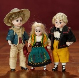 Three German All-Bisque Miniature Dolls in Original Costumes 400/600