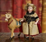 German All-Bisque Miniature Doll with Original Store Costume, and Horse 300/500