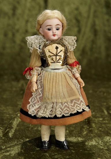 10" German bisque doll, 1079, by Simon and Halbig, wonderful braided wig and costume. $300/400