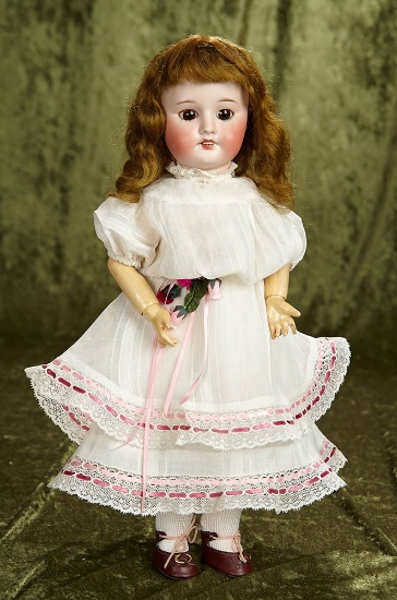 17" French bisque bebe by SFBJ, original body and wig, antique costume. $300/500