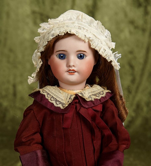 17" French bisque bebe by SFBJ with lovely antique costume. $400/600