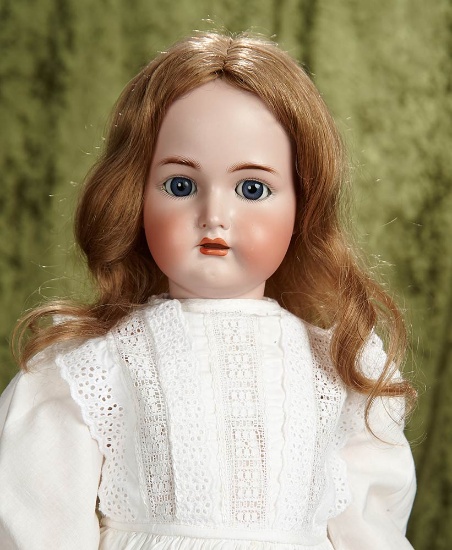 26" German bisque child by Kammer and Reinhardt with beautiful antique costume. $400/600