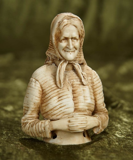 4" German bisque half doll in rare sepia tinting depicting aged lady. $200/400