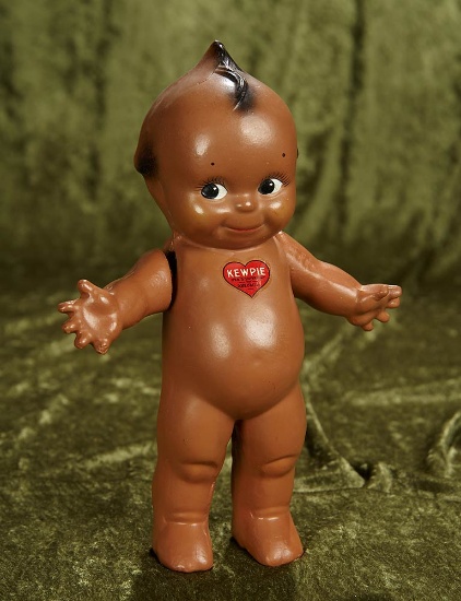 11" American brown-complexioned composition Kewpie by Cameo with red heart label. $200/400