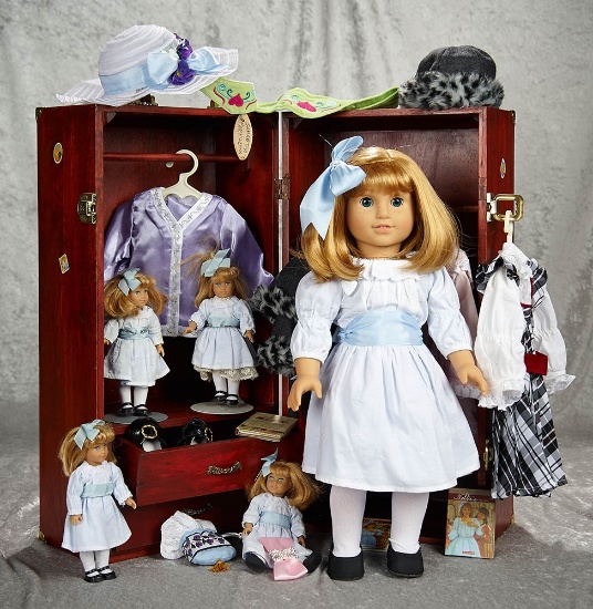 "Nellie" with trunk, costumes and Mini Nellie dolls. $300/500