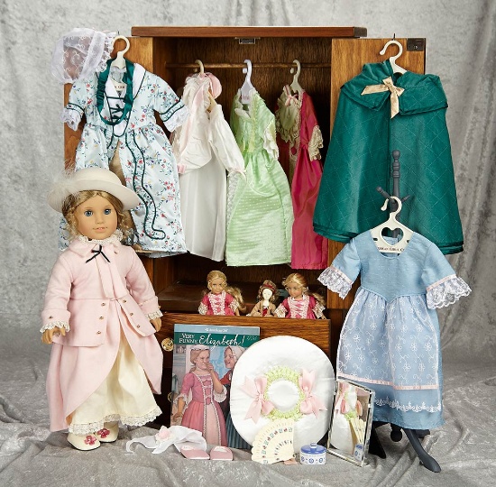 "Elizabeth" with wooden armoire, mini Elizabeth dolls, and extensive trousseau. $500/800