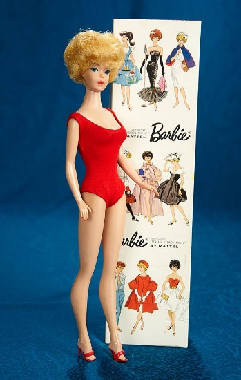 Blonde Bubble-Cut Barbie, 1962 issue, in Original Suit with Box. $300/400