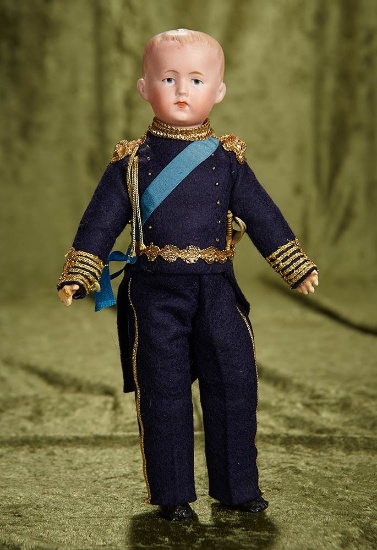 10" German bisque lad with sculpted hair, uniform, possibly Recknagel. $200/300