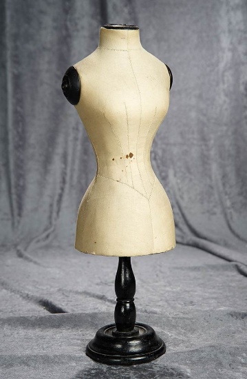 18" French doll-sized lady-shaped mannequin with ebony base and linen form. $600/800