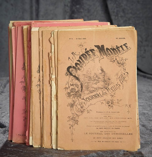 Twenty-Five issues of La Poupee Modele, 1896-1899, including bebe costume patterns. $400/600