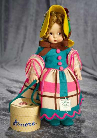 12" Italian felt character girl with hat box labeled "Amore" by Lenci. $400/600