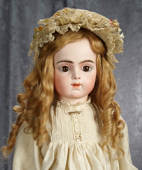 27" French bisque brown-eyed Bebe Bru with original signed body, antique costume. $7000/9000