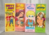 Four boxed sets of nostalgic family paper dolls. $100/200