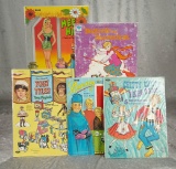 Five vintage paper doll books. $200/300