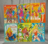Six paper doll books of Barbie and Family. $100/150