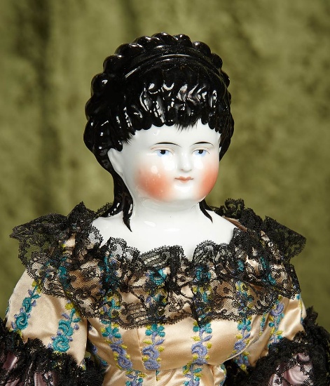 22" German porcelain doll with black sculpted hair in long ringlet curls, lovely costume. $300/500