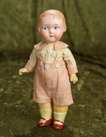 10" German bisque googly, 210, by Marseille, original body, great costume. $400/600