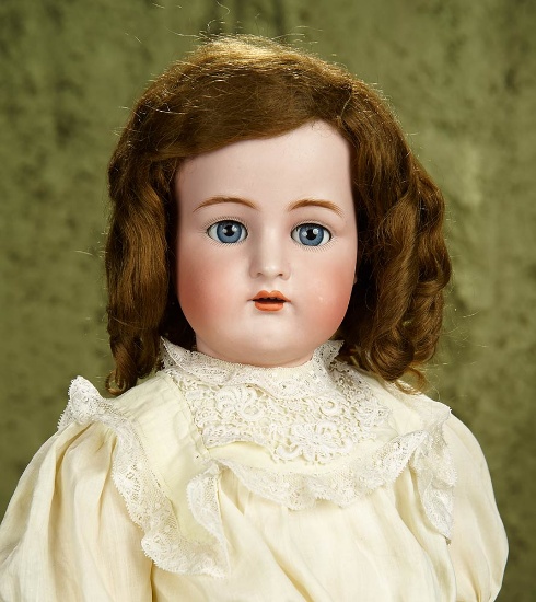 28" German bisque child by Kammer and Reinhardt with pretty antique costume. $400/500