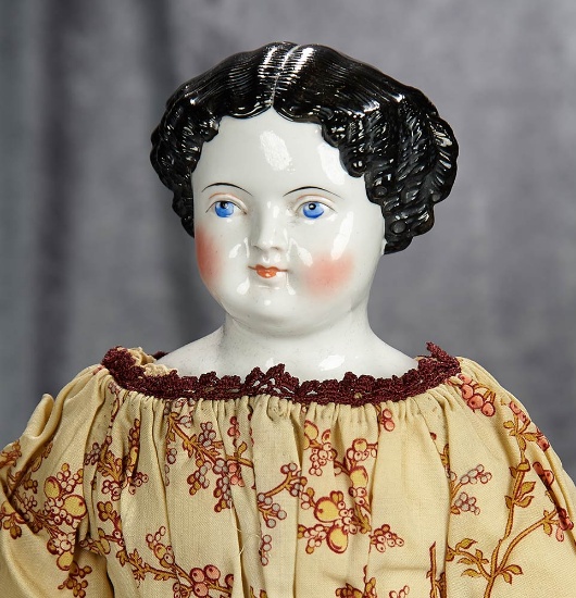 22" German porcelain lady doll with rare red kid leather arms. $300/400