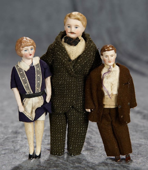 4 1/4"-6". Three German bisque dollhouse dolls in original costumes. $300/400