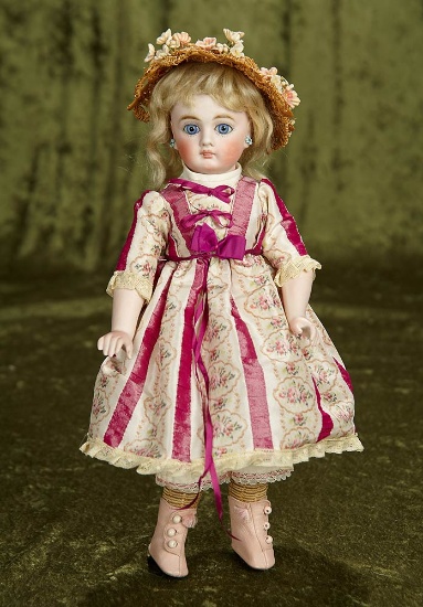 13" Sonneberg bisque child doll with closed mouth, original bisque lower arms. $700/900