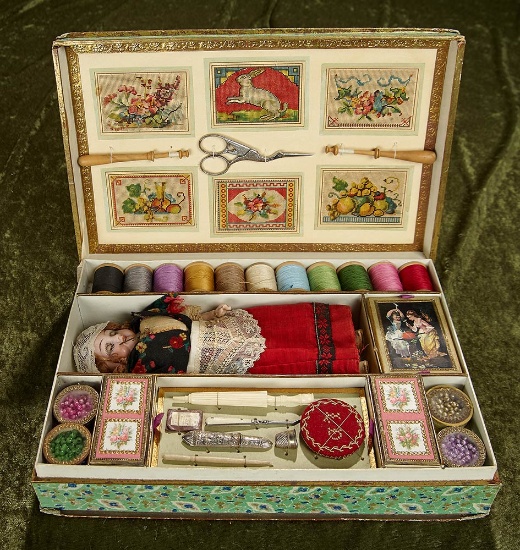 French Tapisserie set with bisque doll and arrangement of sewing supplies and notions. $1200/1500