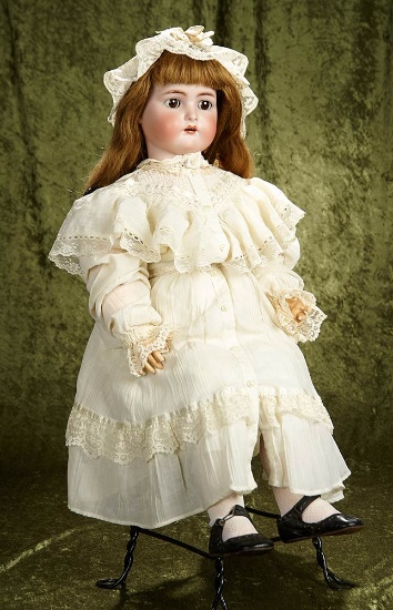 31" German bisque child by Kammer and Reinhardt with wonderful antique costume. $600/800