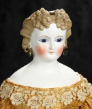 German Bisque Lady with Cobalt Blue Glass Eyes and Brown Sculpted Hair, Gilt Barette 800/1100