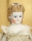 Rare German Bisque Doll with Brown Sculpted Hair and Black Hair Bow by Simon & Halbig 400/600