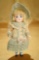 German All-Bisque Miniature Doll with Antique Knit Costume 400/600