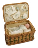 German Bisque Baby in Basket with Costumes and Accessories 400/600
