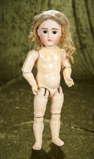 16" German bisque closed mouth child by Kestner, Model IX, with original body. $1100/1500