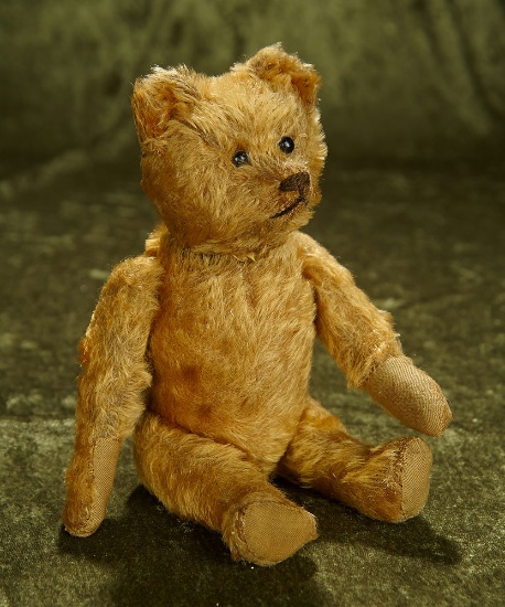 11" German golden mohair "yes/no" teddy with shoe button eyes by Schuco. $400/500
