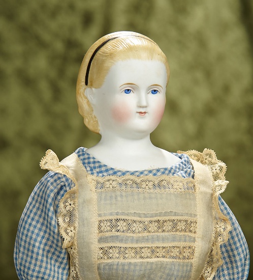 15" German bisque doll with blonde sculpted hair known as Alice in Wonderland. $400/500