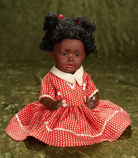 11" Rare German bisque character "Hilda" by Kestner with brown complexion. $1200/1700